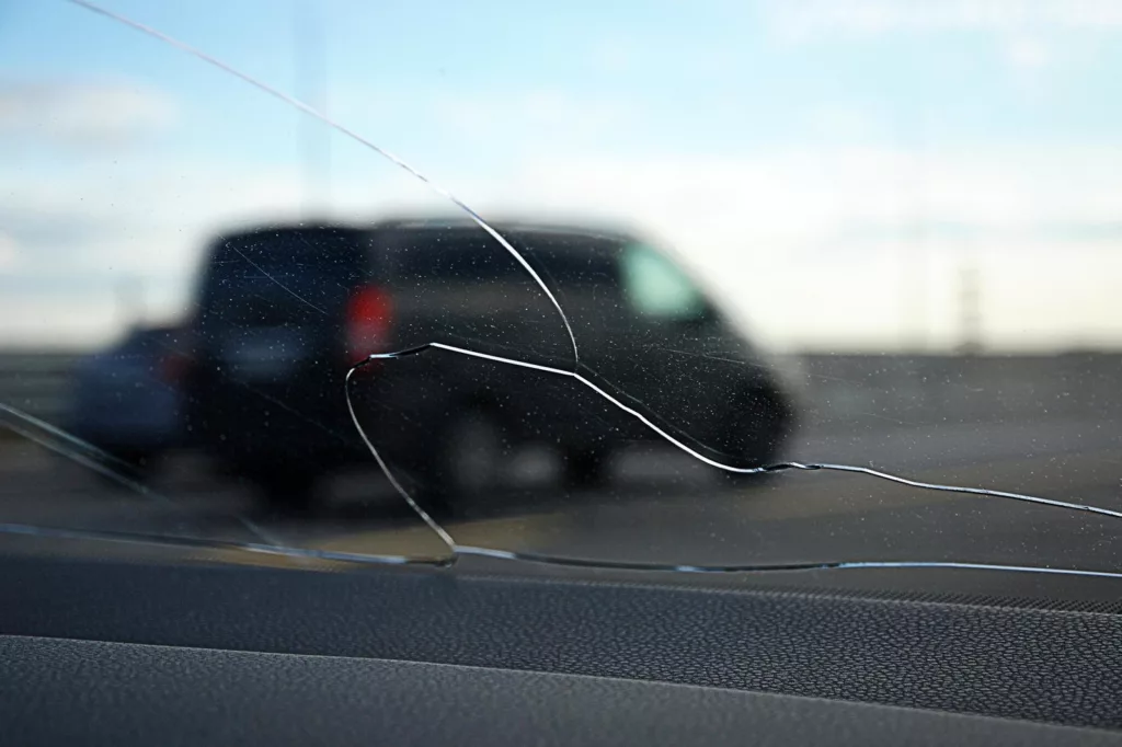 Cracked car windshield needing replacement in Florida